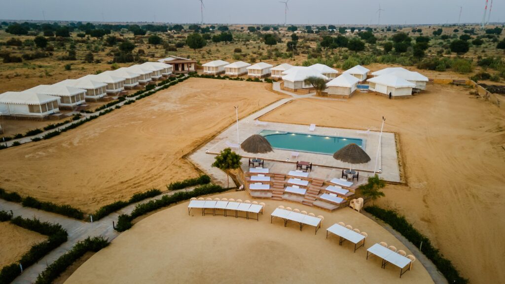 Drone shot of umiya desert camp with swimming pool