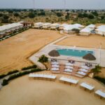 Drone shot of umiya desert camp with swimming pool