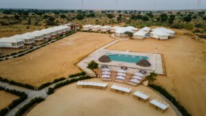 Drone shot of umiya desert camp with swimming pool